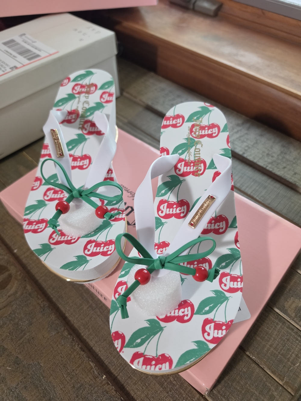 Juicy Couture cherry wedge flip flops